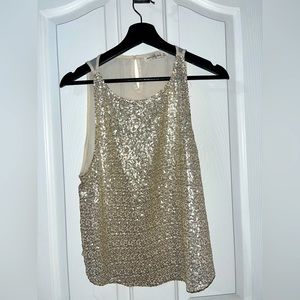 Gold sleeveless blouse
